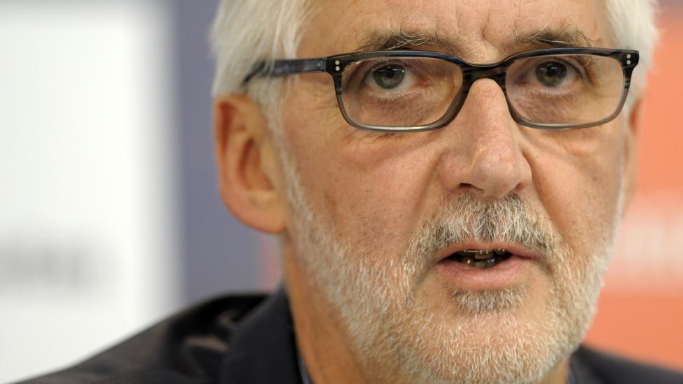 UCI's Brittish President Brian Cookson gives a press conference during the 2014 UCI Road World Championships in Ponferrada, on September 26, 2014.  AFP PHOTO/ MIGUEL RIOPA