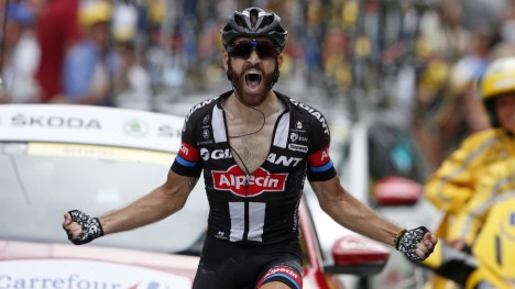 Giant-Alpecin rider Simon Geschke of Germany celebrates as he crosses the finish line to win the 161-km (100 miles) 17th stage of the 102nd Tour de France cycling race from Digne-les-Bains to Pra Loup in the French Alps mountains, France, July 22, 2015. REUTERS/Benoit Tessier