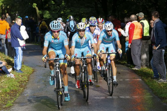 Astana Pro Team riders, Italian rider Diego Rosa (L), Spanish rider Mikel Landa (C) and Italian rider Vincenzo Nibali (R) lead the pack during the 109th edition of the Giro di Lombardia (Tour of Lombardy), a 245 km cycling race from Bergamo to Como on October 4, 2015 in Como. Italy's Vincenzo Nibali won the Tour of Lombardy after launching a daring attack 17.5km from the finish to triumph in the final cycling 'monument' of the season. Nibali, the 2014 Tour de France champion, held off late chasers to cross the line in Como, after a 245km ride from Bergamo, just over 20sec ahead of Spaniard Daniel Moreno with Frenchman Thibaut Pinot finishing a close third. AFP PHOTO POOL / LUCA BETTINI