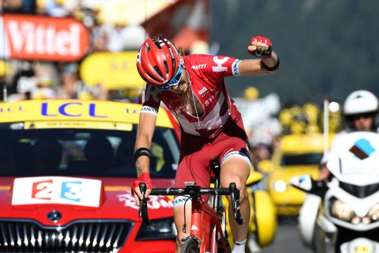 Russia's Ilnur Zakarin celebrates as he crosses the finish line at the end of the 184,5 km seventeenth stage of the 103rd edition of the Tour de France cycling race on July 20, 2016 between Berne and Finhaut-Emosson. / AFP PHOTO / LIONEL BONAVENTURE