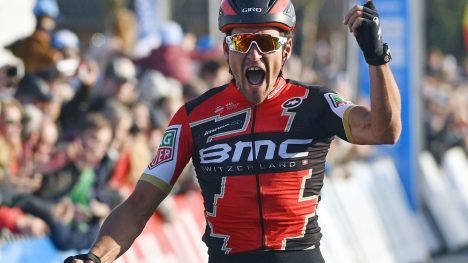 Belgian cyclist Greg Van Avermaet of BMC Racing Team celebrates as he crosses the finish line to win the 60th edition of the E3 Harelbeke cycling race