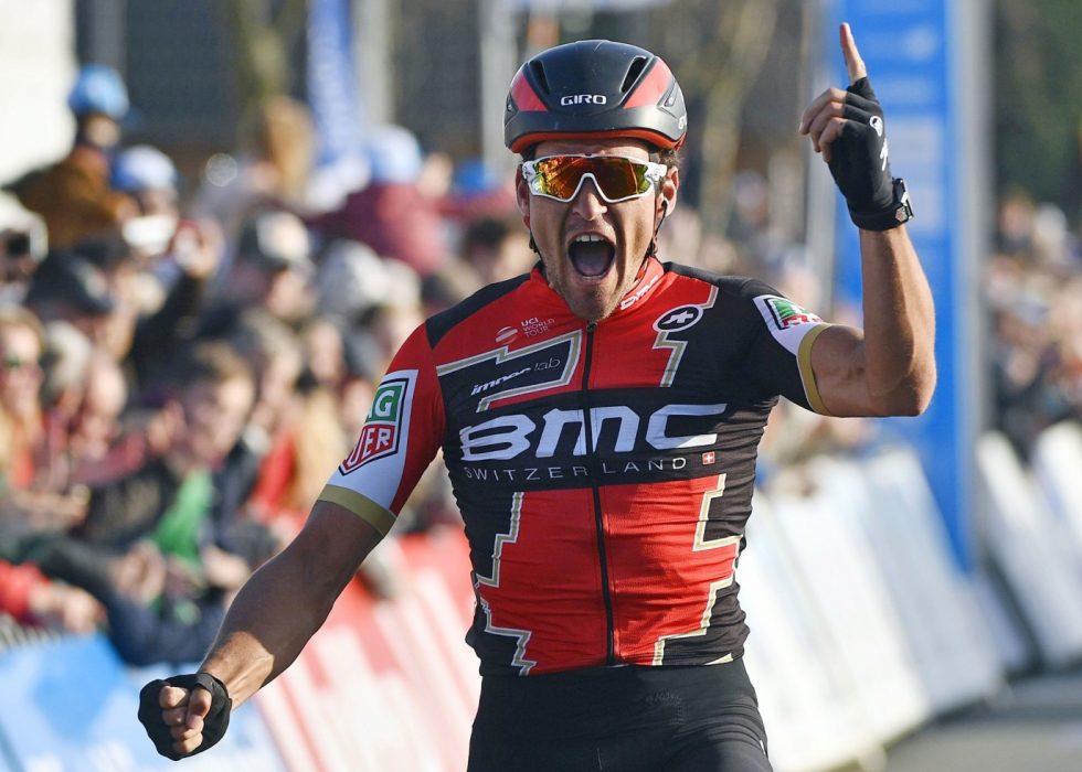 Belgian cyclist Greg Van Avermaet of BMC Racing Team celebrates as he crosses the finish line to win the 60th edition of the E3 Harelbeke cycling race
