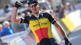 Belgian cyclist Philippe Gilbert of Quick-Step Floors celebrates as he crosses the finish line to win the first stage of the Driedaagse De Panne - Koksijde cycling race
