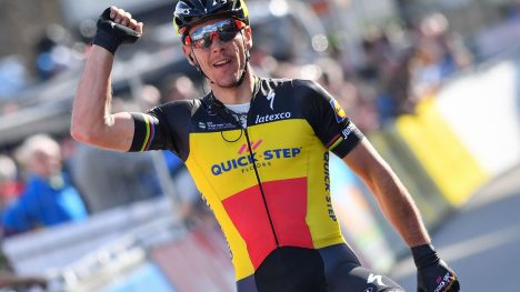 Belgian cyclist Philippe Gilbert of Quick-Step Floors celebrates as he crosses the finish line to win the first stage of the Driedaagse De Panne - Koksijde cycling race
