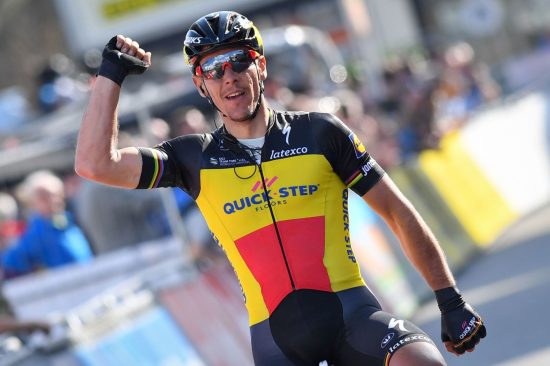 Belgian cyclist Philippe Gilbert of Quick-Step Floors celebrates as he crosses the finish line to win the first stage of the Driedaagse De Panne - Koksijde cycling race