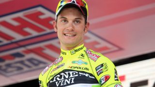 MÅ VENTE LITT TIL: Andrea Guardini vant sin hittil eneste etappeseier i Giro d'Italia tilbake i 2012. Denne våren er sykkeleventyret på hjemmebane alt overstått for 28-åringen. AFP PHOTO / LUK BENIES