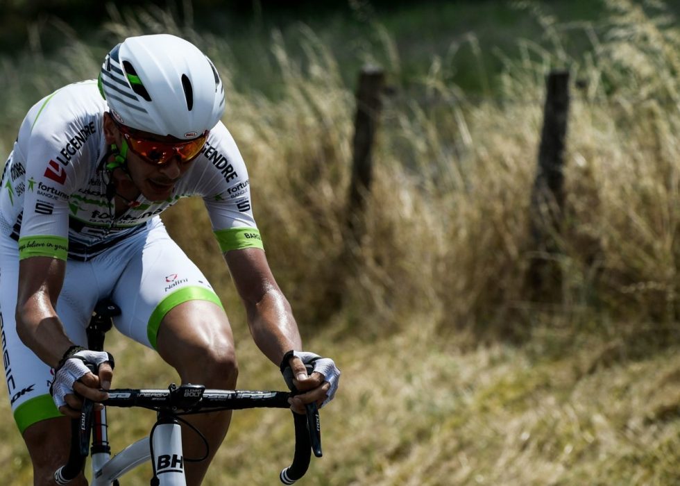 UT PÅ VIDDA: Warren Barguil ble blåst av veien på andre etappe av Arctic Race. Her fra Tour de France. Foto: AFP PHOTO / Philippe LOPEZ